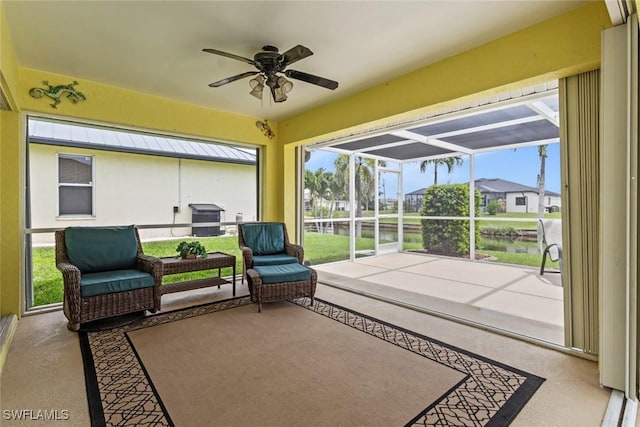 608 SW 43rd Ter, Cape Coral, FL 33914 - sunroom with ceiling fan and a water view