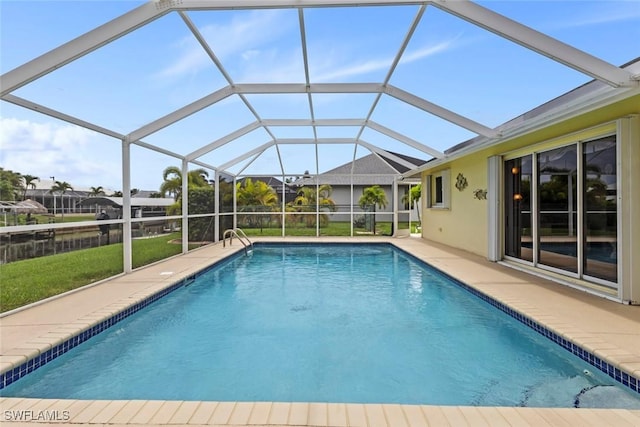 608 SW 43rd Ter, Cape Coral, FL 33914 - outdoor pool with a patio area, a yard, and a lanai