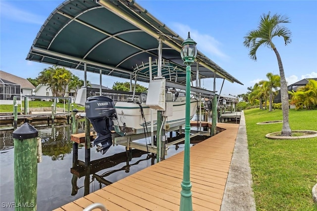608 SW 43rd Ter, Cape Coral, FL 33914 - dock area featuring boat lift, a yard, and a water view