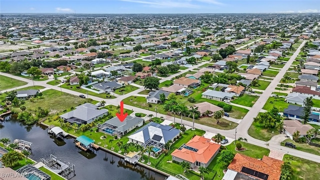 608 SW 43rd Ter, Cape Coral, FL 33914 - aerial view of residential area with a large body of water