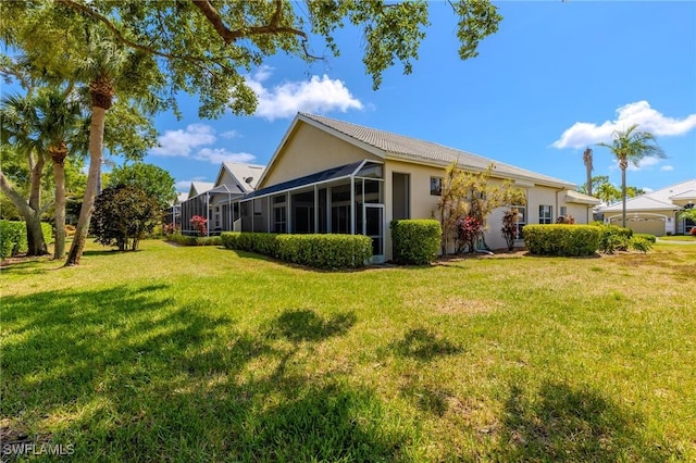 19372 Silver Oak Dr, Estero, FL 33967 - back of property with a yard and stucco siding