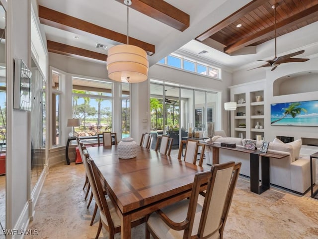 14822 Bellezza Ln, Naples, FL 34110 - dining room featuring beam ceiling, a ceiling fan, and baseboards