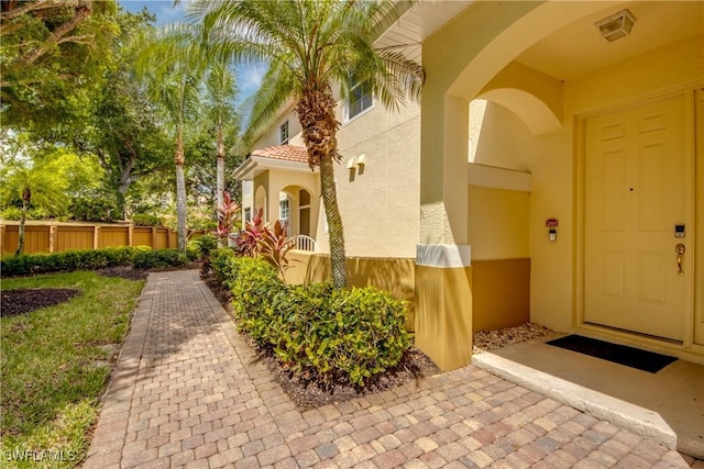 5912 Tarpon Gardens Cir Unit 201, Cape Coral, FL 33914 - property entrance with stucco siding