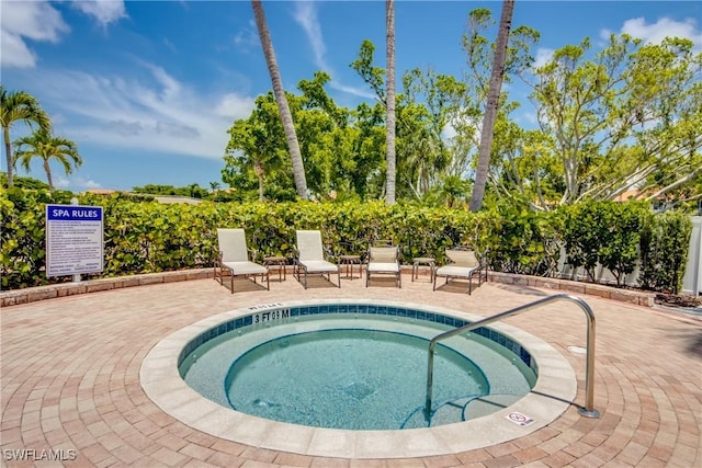 5912 Tarpon Gardens Cir Unit 201, Cape Coral, FL 33914 - view of pool with a patio and a pool