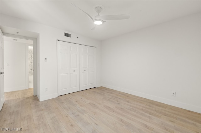 16410 Kelly Cove Dr Unit 313, Fort Myers, FL 33908 - unfurnished bedroom with light wood-style floors, baseboards, and a closet