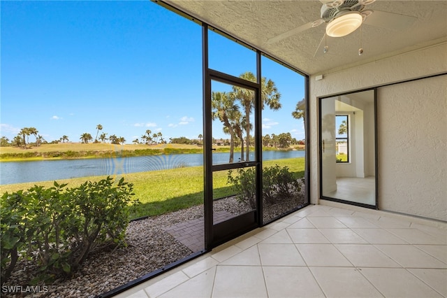 16410 Kelly Cove Dr Unit 313, Fort Myers, FL 33908 - unfurnished sunroom with ceiling fan and a water view