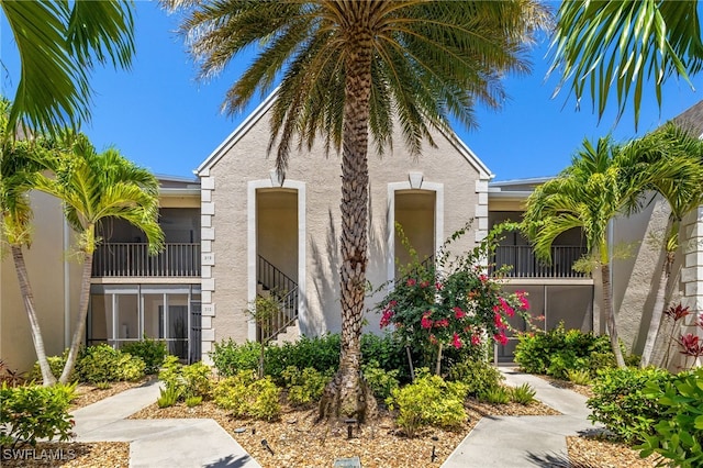 16410 Kelly Cove Dr Unit 313, Fort Myers, FL 33908 - view of front of home with stucco siding