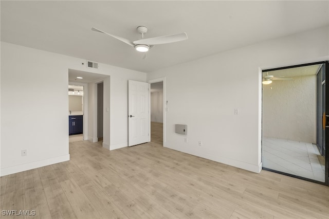 16410 Kelly Cove Dr Unit 313, Fort Myers, FL 33908 - unfurnished bedroom featuring light wood finished floors, baseboards, and ceiling fan