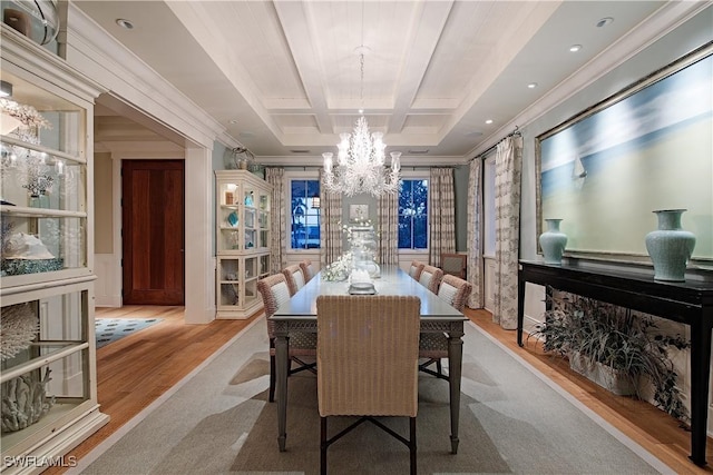 2001 4th St S, Naples, FL 34102 - dining space with a chandelier, wood finished floors, ornamental molding, and coffered ceiling