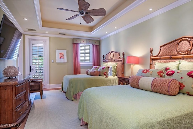 2001 4th St S, Naples, FL 34102 - bedroom featuring a tray ceiling, recessed lighting, ornamental molding, carpet flooring, and a ceiling fan