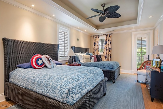 2001 4th St S, Naples, FL 34102 - bedroom featuring wood finished floors, a raised ceiling, recessed lighting, ornamental molding, and ceiling fan