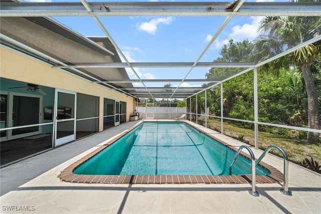 1237 SE 24th Ave Unit A, Cape Coral, FL 33990 - view of swimming pool with a patio and glass enclosure