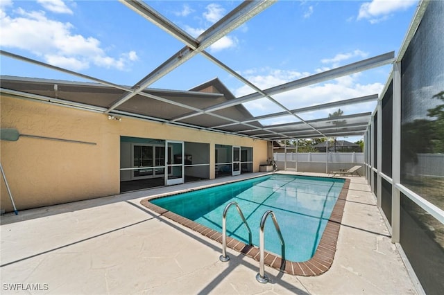 1237 SE 24th Ave Unit A, Cape Coral, FL 33990 - view of swimming pool featuring a patio area and glass enclosure