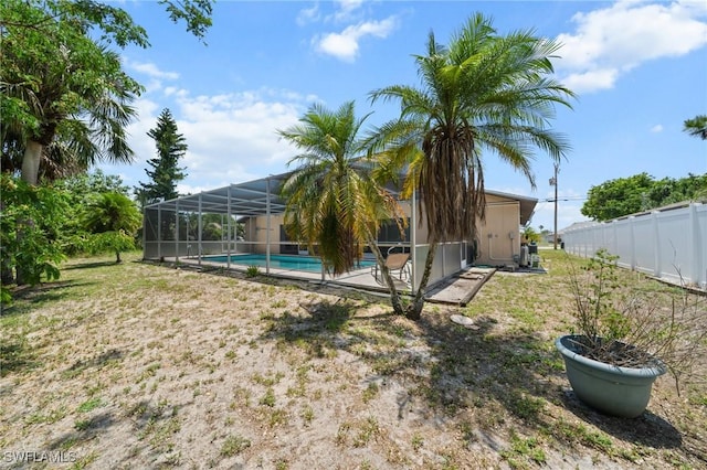 1237 SE 24th Ave Unit A, Cape Coral, FL 33990 - view of yard with glass enclosure