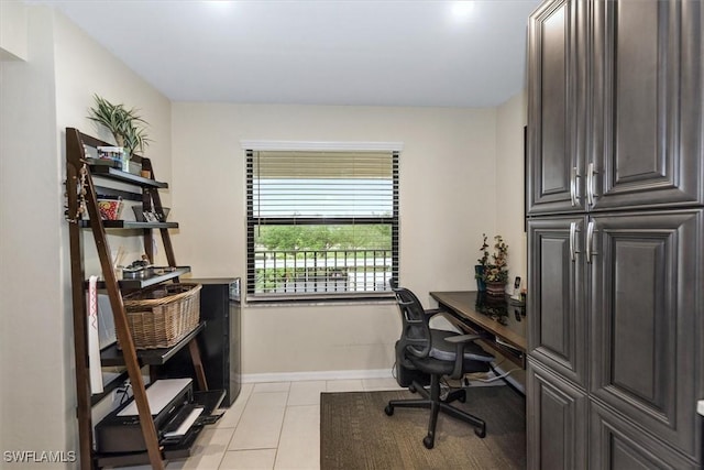 12581 Kelly Sands Way Unit 525, Fort Myers, FL 33908 - home office featuring light tile patterned floors and baseboards