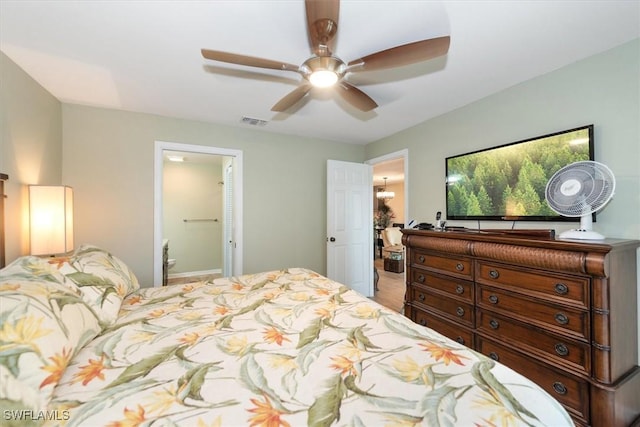 12581 Kelly Sands Way Unit 525, Fort Myers, FL 33908 - bedroom with ceiling fan and connected bathroom