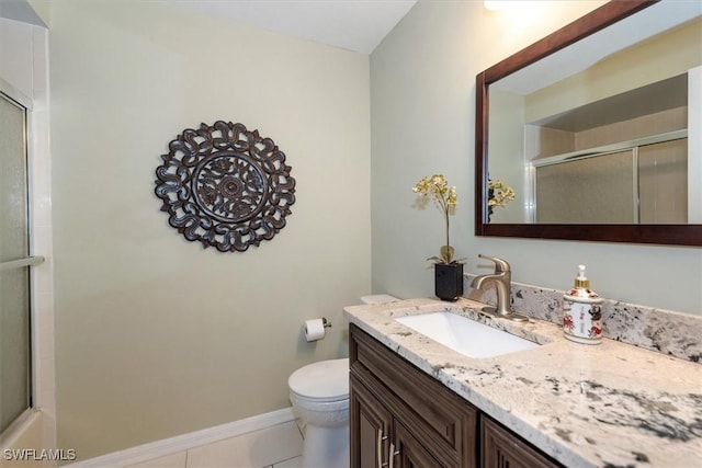 12581 Kelly Sands Way Unit 525, Fort Myers, FL 33908 - full bath featuring vanity, toilet, tile patterned flooring, and baseboards