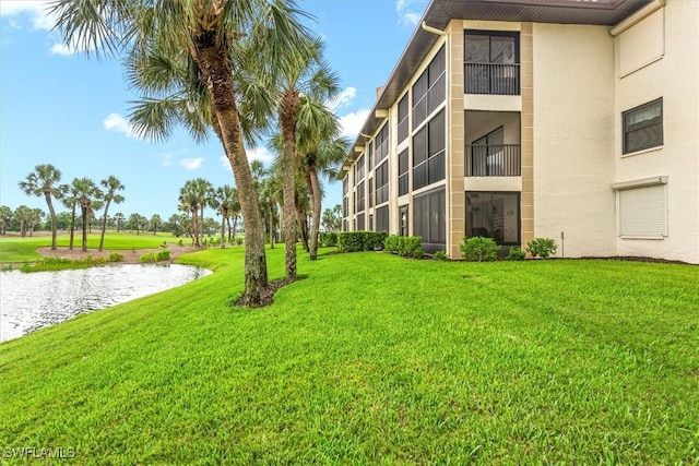 12581 Kelly Sands Way Unit 525, Fort Myers, FL 33908 - view of property's community featuring a water view and a yard