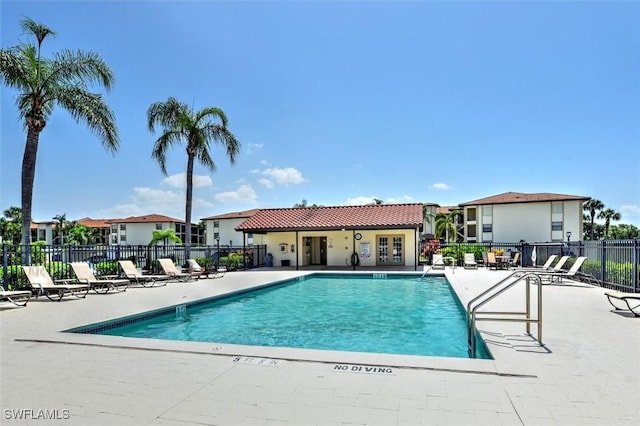 12581 Kelly Sands Way Unit 525, Fort Myers, FL 33908 - community pool with a patio area and a residential view