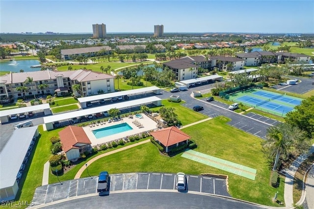 12581 Kelly Sands Way Unit 525, Fort Myers, FL 33908 - bird's eye view of a pool and a large body of water