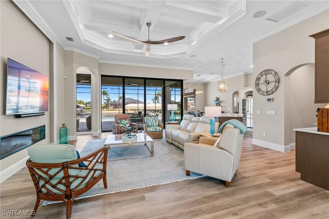 4324 SW 26th Ave, Cape Coral, FL 33914 - living area featuring arched walkways, ceiling fan, crown molding, coffered ceiling, and light wood-type flooring
