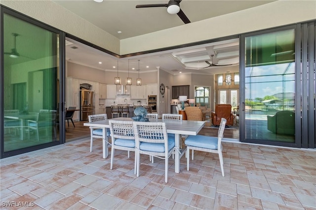 4324 SW 26th Ave, Cape Coral, FL 33914 - dining space with ceiling fan, recessed lighting, a high ceiling, crown molding, and light stone finish floors