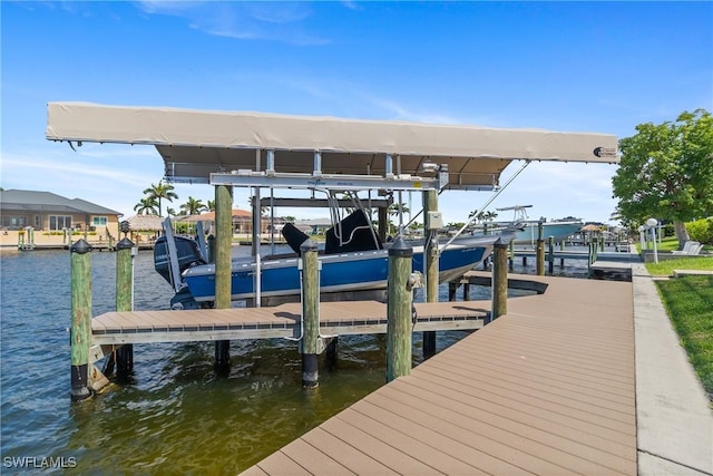 4324 SW 26th Ave, Cape Coral, FL 33914 - dock area featuring boat lift and a water view