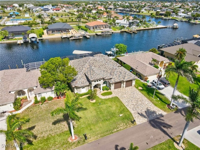 4324 SW 26th Ave, Cape Coral, FL 33914 - aerial perspective of suburban area featuring a nearby body of water