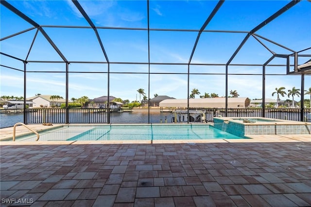 4324 SW 26th Ave, Cape Coral, FL 33914 - view of swimming pool with a patio, a water view, and a lanai