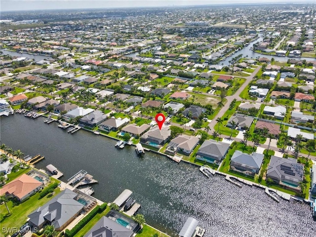 4324 SW 26th Ave, Cape Coral, FL 33914 - aerial perspective of suburban area featuring a large body of water