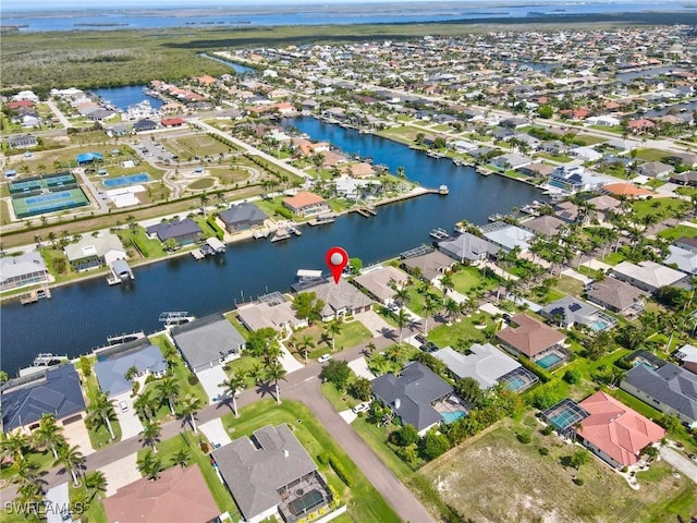 4324 SW 26th Ave, Cape Coral, FL 33914 - aerial view of property and surrounding area featuring nearby suburban area and a nearby body of water