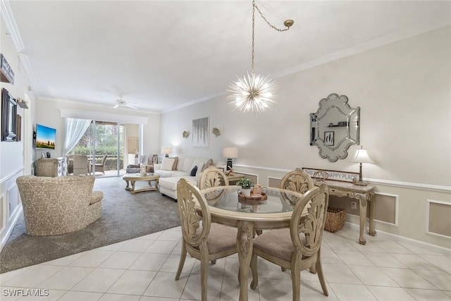 14550 Red Fox Run Unit 407, Naples, FL 34110 - dining area featuring ornamental molding, a chandelier, light carpet, light tile patterned floors, and a wainscoted wall