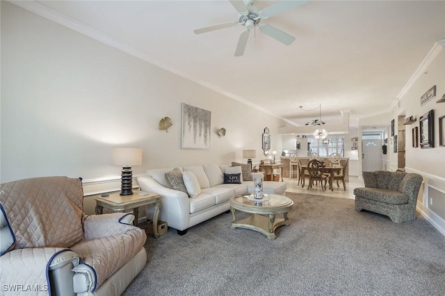 14550 Red Fox Run Unit 407, Naples, FL 34110 - living area with ornamental molding, carpet flooring, a ceiling fan, and a chandelier