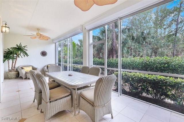 14550 Red Fox Run Unit 407, Naples, FL 34110 - sunroom with a ceiling fan and outdoor dining space