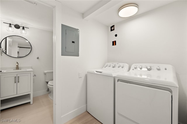 16260 Kelly Cove Dr Unit 235, Fort Myers, FL 33908 - laundry room with electric panel, separate washer and dryer, and baseboards
