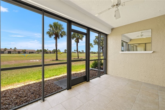 16260 Kelly Cove Dr Unit 235, Fort Myers, FL 33908 - unfurnished sunroom featuring a ceiling fan