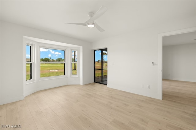 16260 Kelly Cove Dr Unit 235, Fort Myers, FL 33908 - empty room featuring a ceiling fan and light wood-type flooring