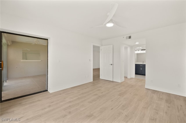 16260 Kelly Cove Dr Unit 235, Fort Myers, FL 33908 - empty room featuring a ceiling fan and light wood finished floors