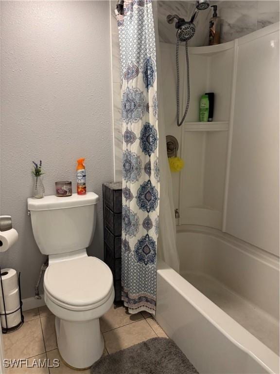 5751 Foxlake Dr Unit A, North Fort Myers, FL 33917 - bathroom with tile patterned flooring, toilet, and shower / bath combo