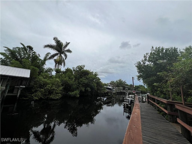 5751 Foxlake Dr Unit A, North Fort Myers, FL 33917 - dock area with a water view