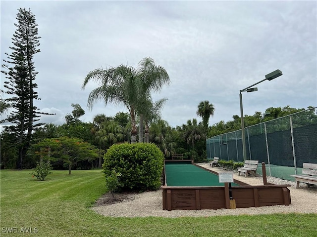 5751 Foxlake Dr Unit A, North Fort Myers, FL 33917 - view of community featuring a bocce ball area