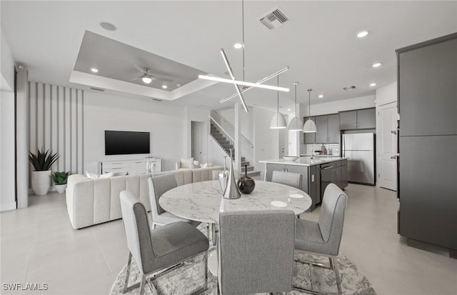 12412 Basalt Ln, Alva, FL 33982 - dining space with stairs, a ceiling fan, and recessed lighting