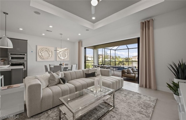 12412 Basalt Ln, Alva, FL 33982 - living room with recessed lighting, a sunroom, a ceiling fan, crown molding, and a raised ceiling