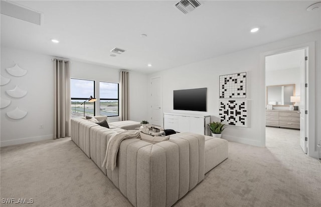 12412 Basalt Ln, Alva, FL 33982 - living area featuring light carpet, recessed lighting, and baseboards