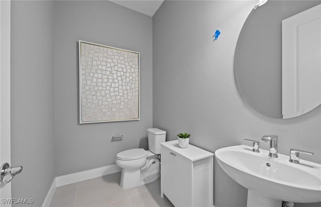 12412 Basalt Ln, Alva, FL 33982 - bathroom featuring a sink, toilet, and tile patterned floors