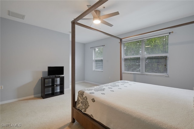 4381 Lazio Way Unit 504, Fort Myers, FL 33901 - carpeted bedroom featuring baseboards and ceiling fan