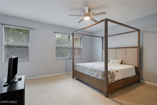4381 Lazio Way Unit 504, Fort Myers, FL 33901 - carpeted bedroom with baseboards and a ceiling fan