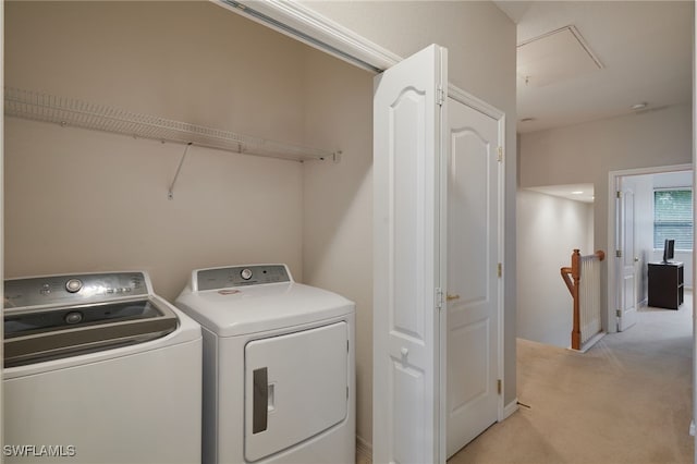 4381 Lazio Way Unit 504, Fort Myers, FL 33901 - laundry area with attic access, washer and dryer, and light carpet