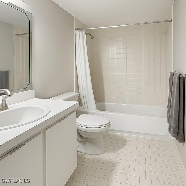 440 Seaview Ct Unit 1012, Marco Island, FL 34145 - full bath with shower / tub combo with curtain, tile patterned floors, vanity, and toilet