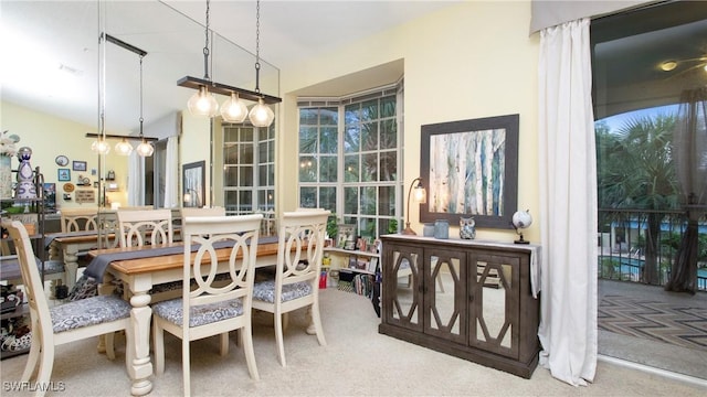 96 Silver Oaks Cir Unit 1-202, Naples, FL 34119 - dining space featuring carpet floors